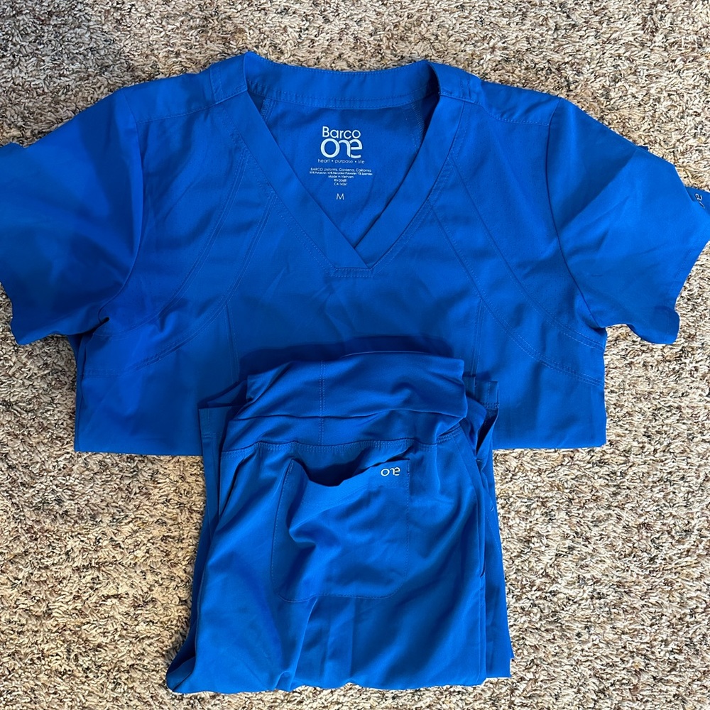 Barco One scrubs. Medium top with medium tall bottoms. Gently used.
